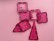 ein gemaltes rosafarbenes Chamäleon versteckt sich zwischen verschiedenen rosafarbenen Gegenständen